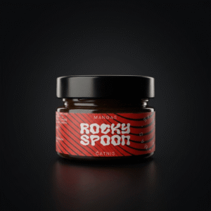 Rocky Spoon mango čatnis stiklainyje ant tamsaus fono / Rocky Spoon mango chutney jar on dark background premium product photo