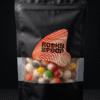Rocky Spoon liofilizuoti spalvoti saldainiai spalvainukai pakuotėje / Rocky Spoon freeze-dried colorful candy bites in pouch on dark background